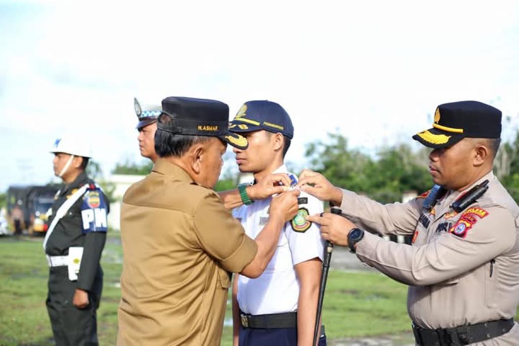 Bupati Asmar Pimpin Apel Gelar Pasukan Operasi Lilin Lancang Kuning Tahun 2024